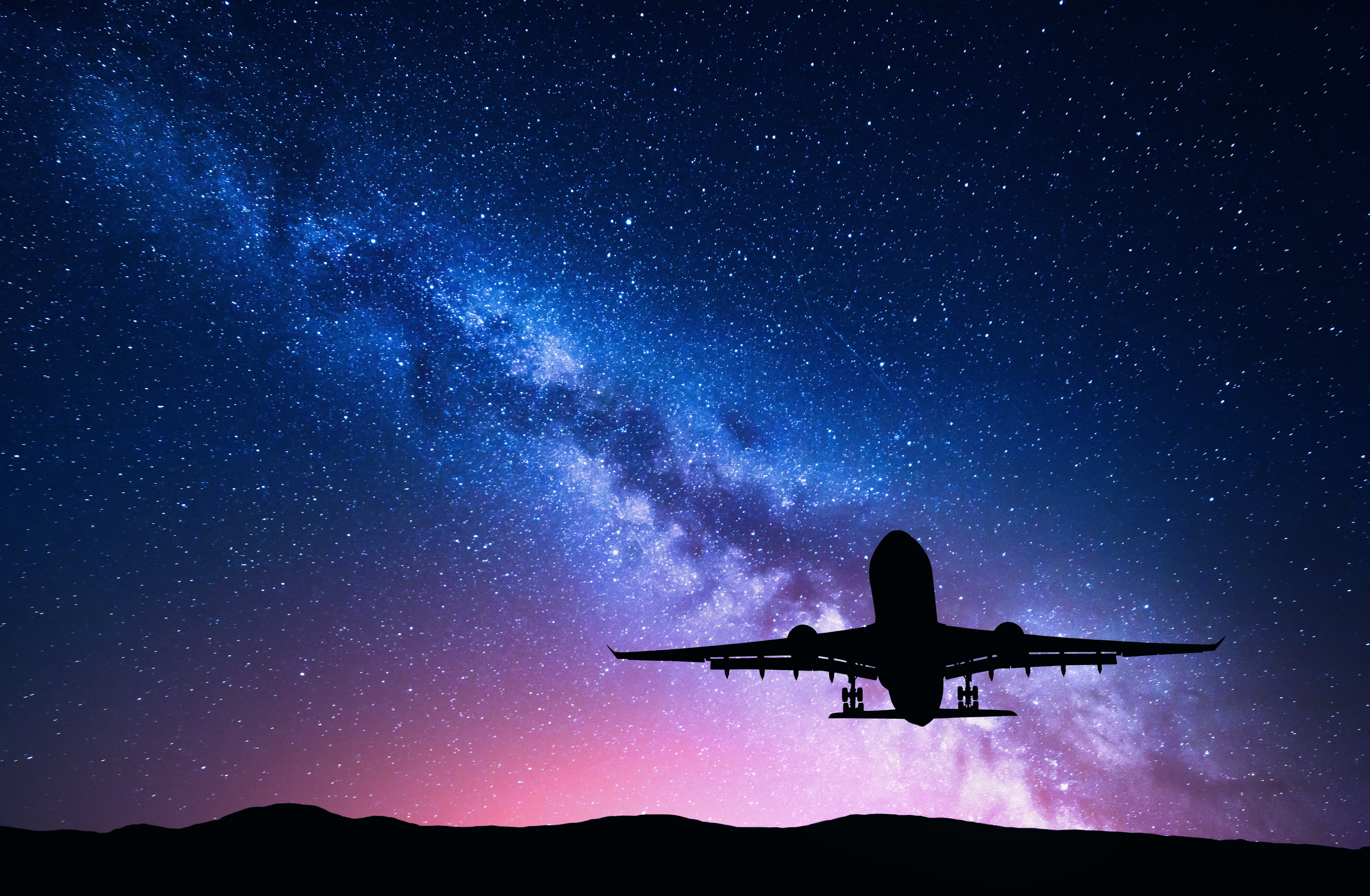milky-way-and-silhouette-of-a-airplane